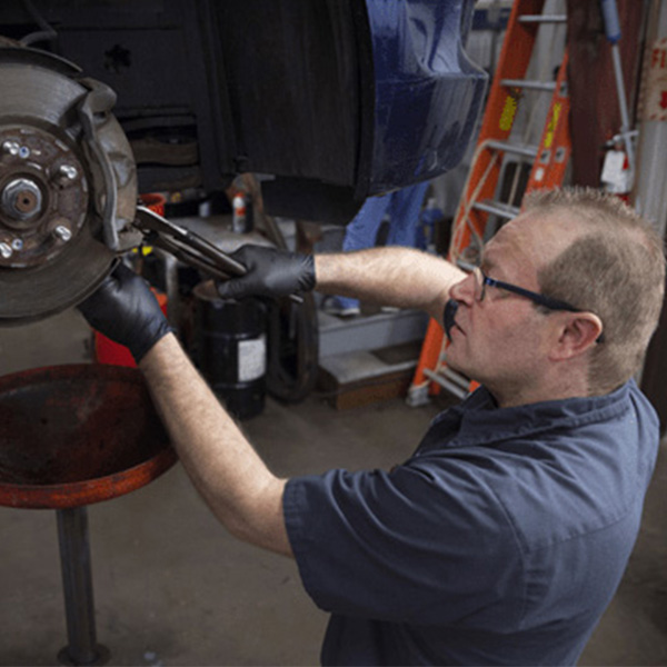 mechanic fixing tires